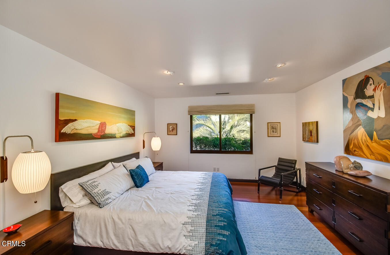 2174 Midlothian Drive Altadena, CA 91001 - Photo 34 of 54 a living room with furniture and a flat screen tv