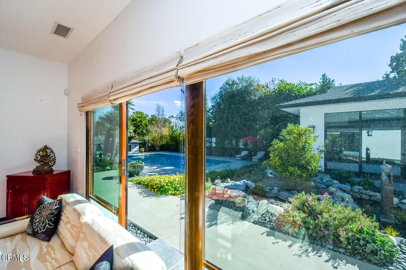 2174 Midlothian Drive Altadena, CA 91001 - Photo 40 of 54 a front view of a house with garden