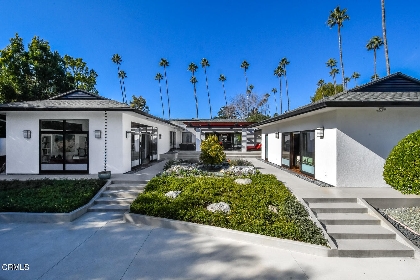 2174 Midlothian Drive Altadena, CA 91001 - Photo 43 of 54 a front view of a house with garden