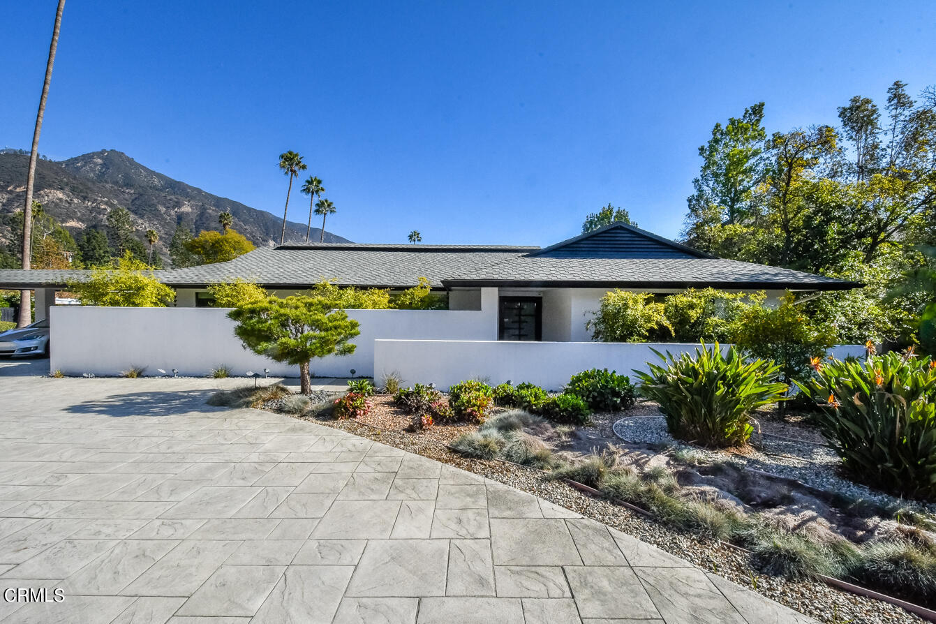 2174 Midlothian Drive Altadena, CA 91001 - Photo 53 of 54 a front view of a house with a yard