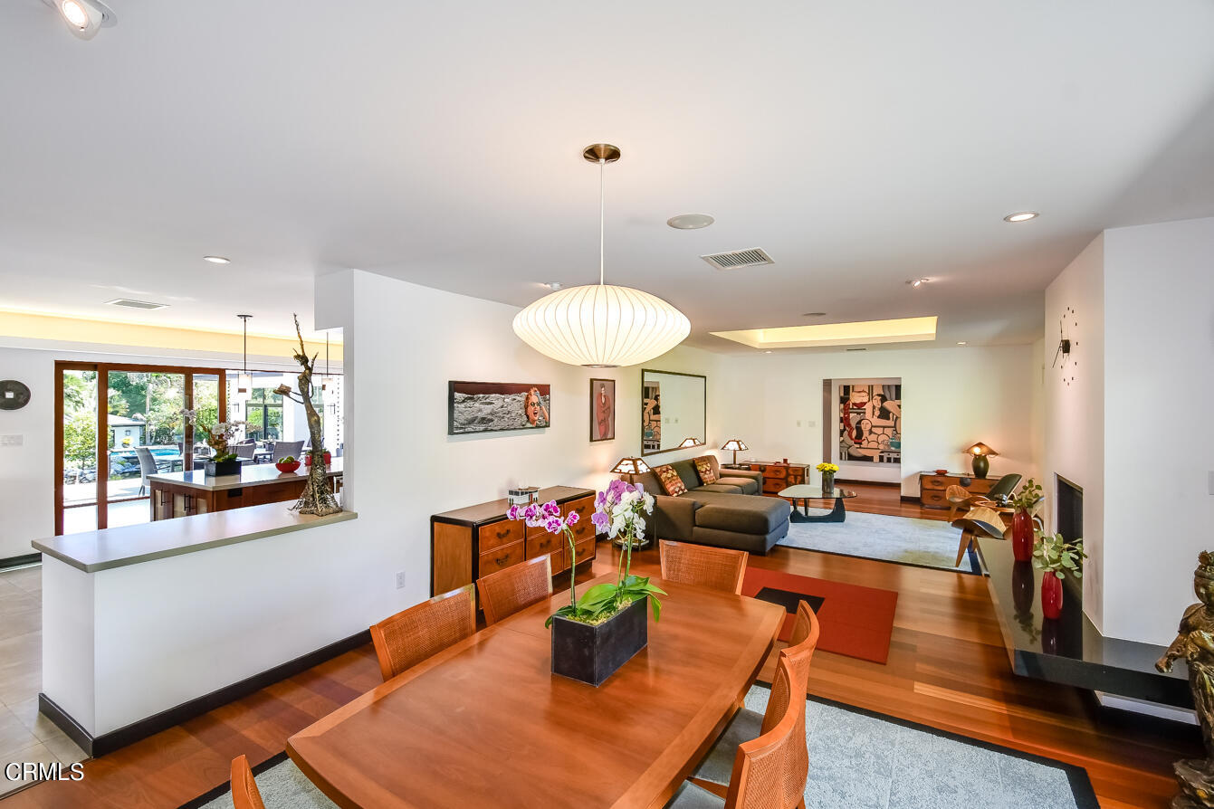 2174 Midlothian Drive Altadena, CA 91001 - Photo 8 of 54 a living room with furniture and a wooden floor