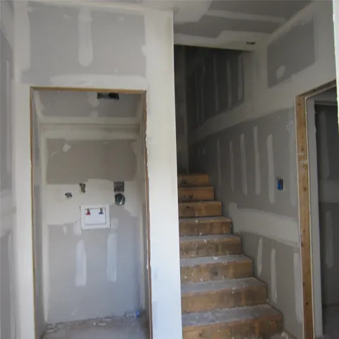 a view of an entryway with hallway