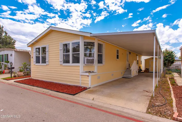 a view of a house with a patio