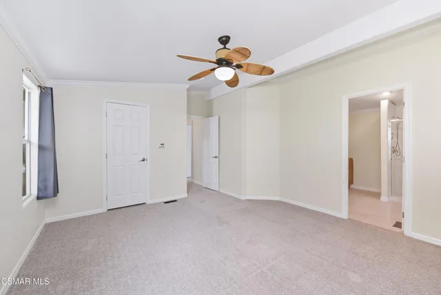 a bathroom with a granite countertop sink mirror and a bathtub