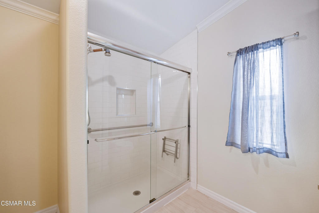 89 Via Gabilan Camarillo, CA 93012 - Photo 21 of 34 a bathroom with a shower and a glass door