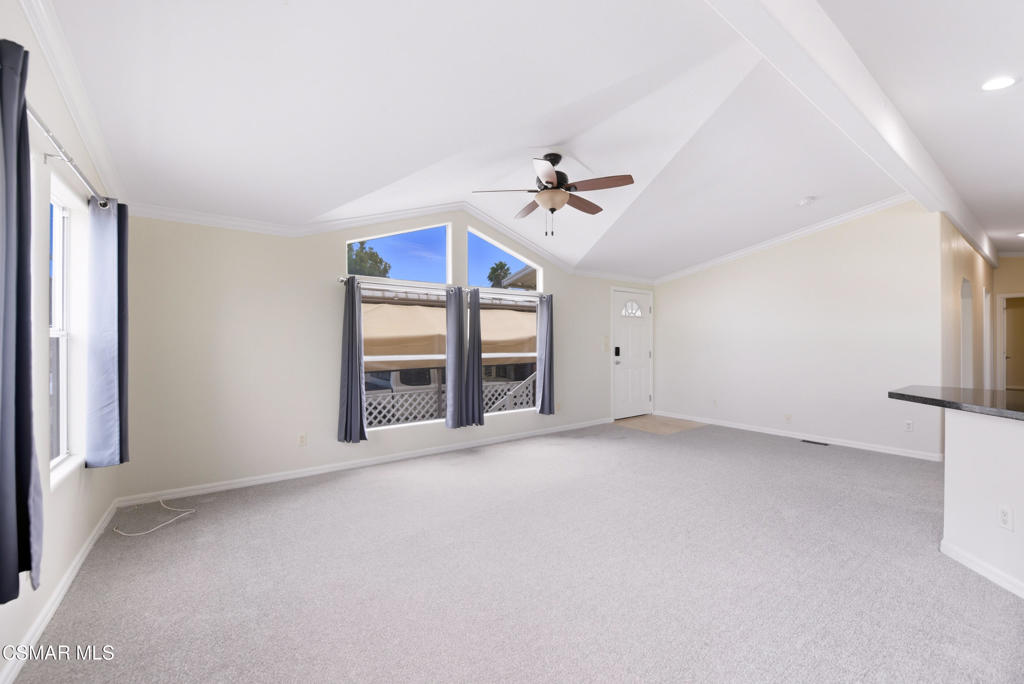 89 Via Gabilan Camarillo, CA 93012 - Photo 7 of 34 an empty room with a window and a kitchen