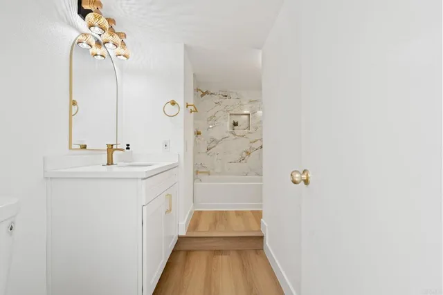 a workspace with furniture and wooden floor