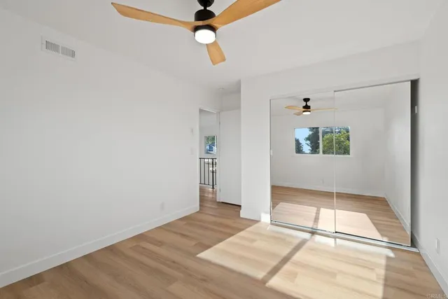 an aerial view of a house with swimming pool