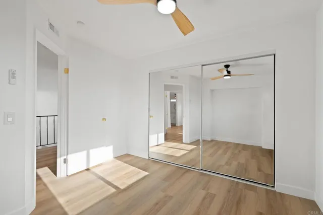 an aerial view of a city with lots of residential buildings