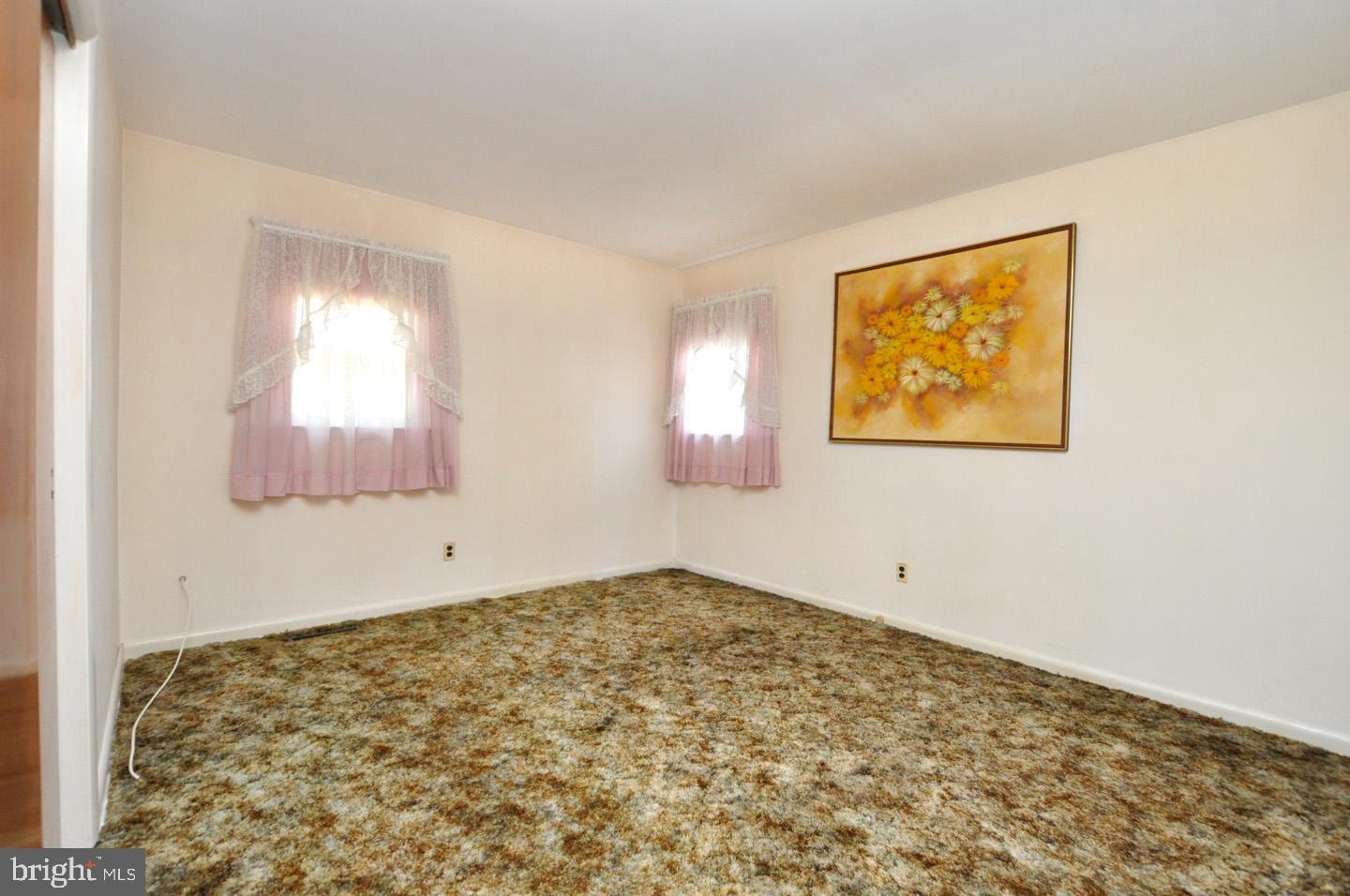 811 Fordham Street Delran, NJ 08075 - Photo 8 of 20 a view of an empty room and window