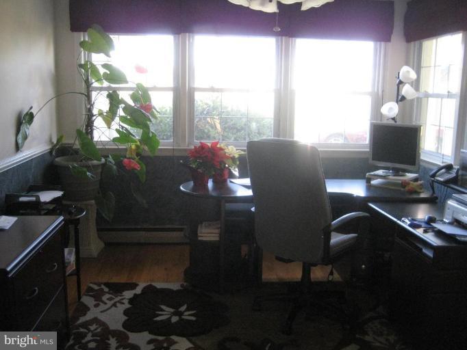 17019 West Willard Road Poolesville, MD 20837 - Photo 13 of 24 a living room with furniture and a window