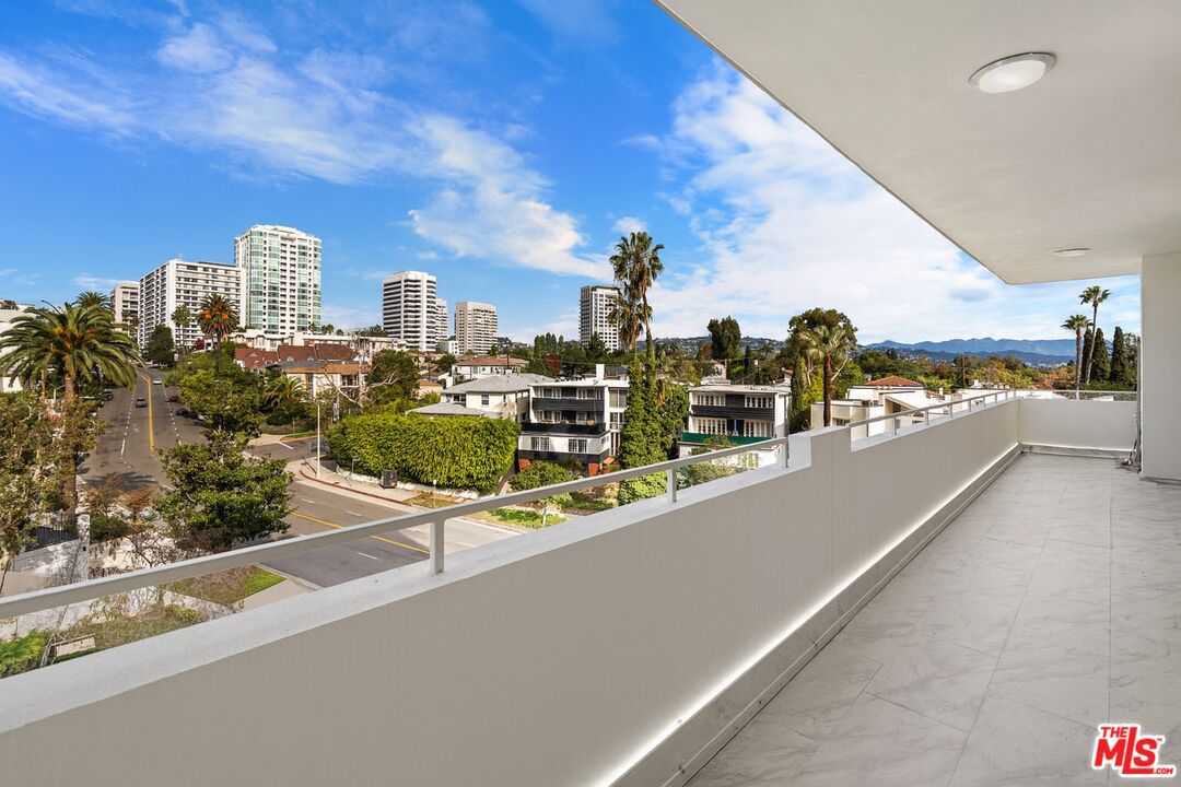 1333 South Beverly Glen Boulevard, Unit 605 Los Angeles, CA 90024 - Photo 22 of 27 a view of a balcony with city view