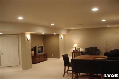 0 Point Phillips Road Bath, PA 18014 - Photo 4 of 8 a living room with furniture and a flat screen tv