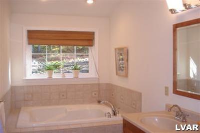 0 Point Phillips Road Bath, PA 18014 - Photo 6 of 8 a bath tub sitting next to a window