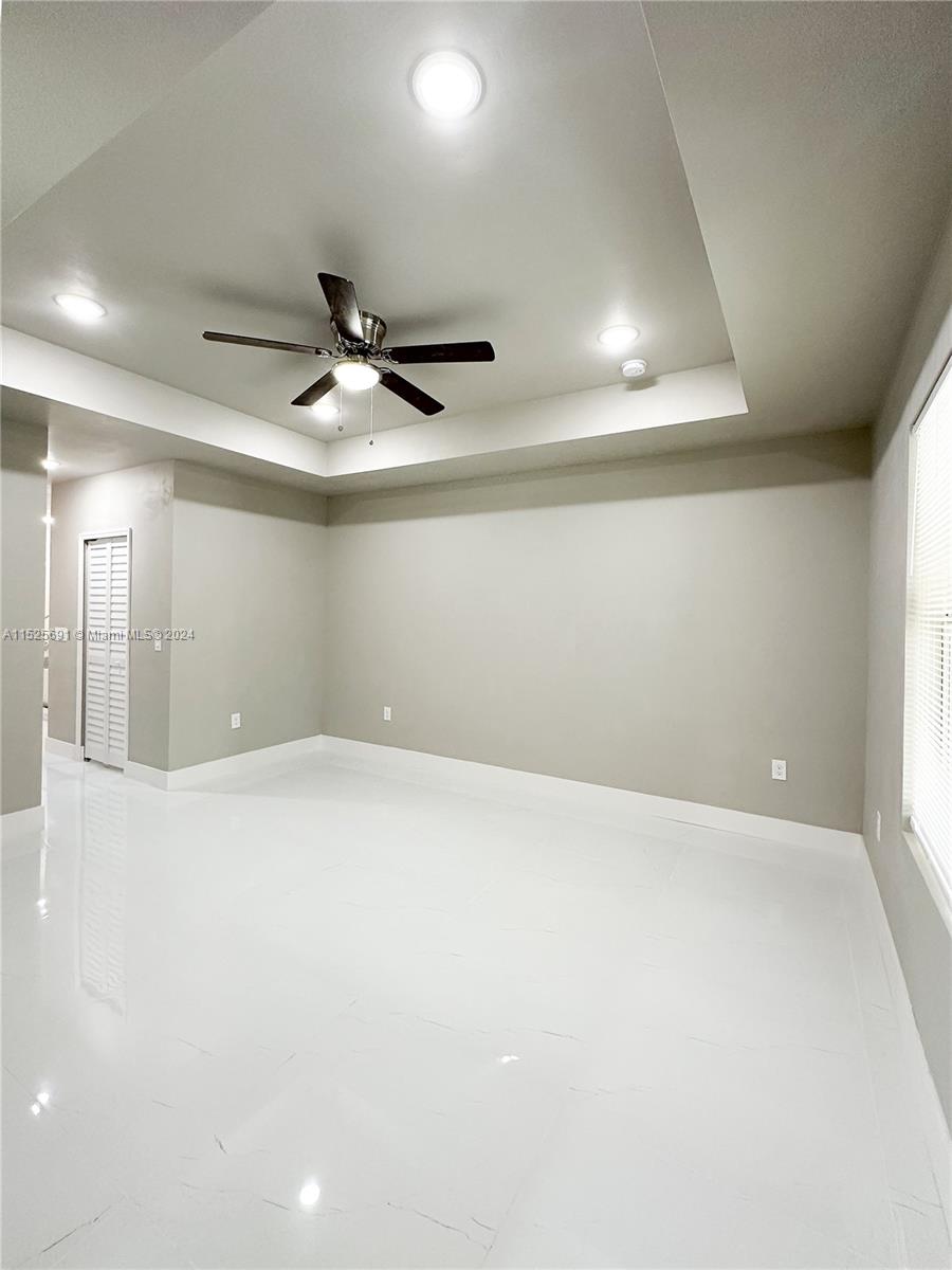 828 Homestead Road South Lehigh Acres, FL 33974 - Photo 26 of 48 a view of an empty room