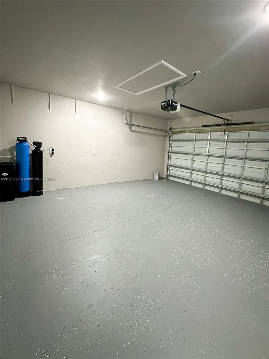 828 Homestead Road South Lehigh Acres, FL 33974 - Photo 37 of 48 a view of a garage room