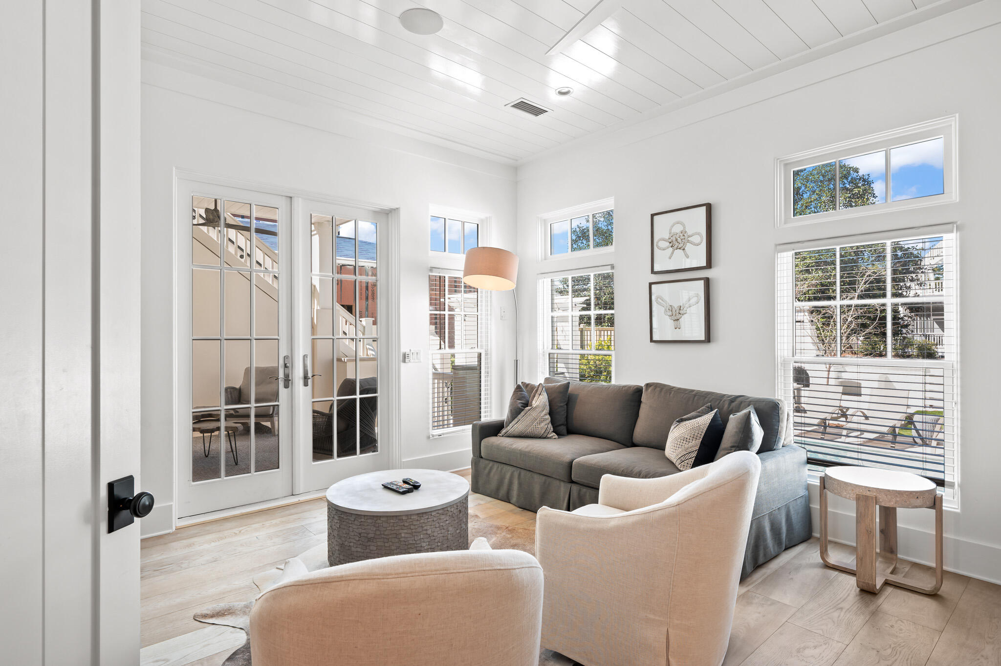 390 Walton Rose Lane Inlet Beach, FL 32461 - Photo 17 of 72 a living room with furniture and a large window