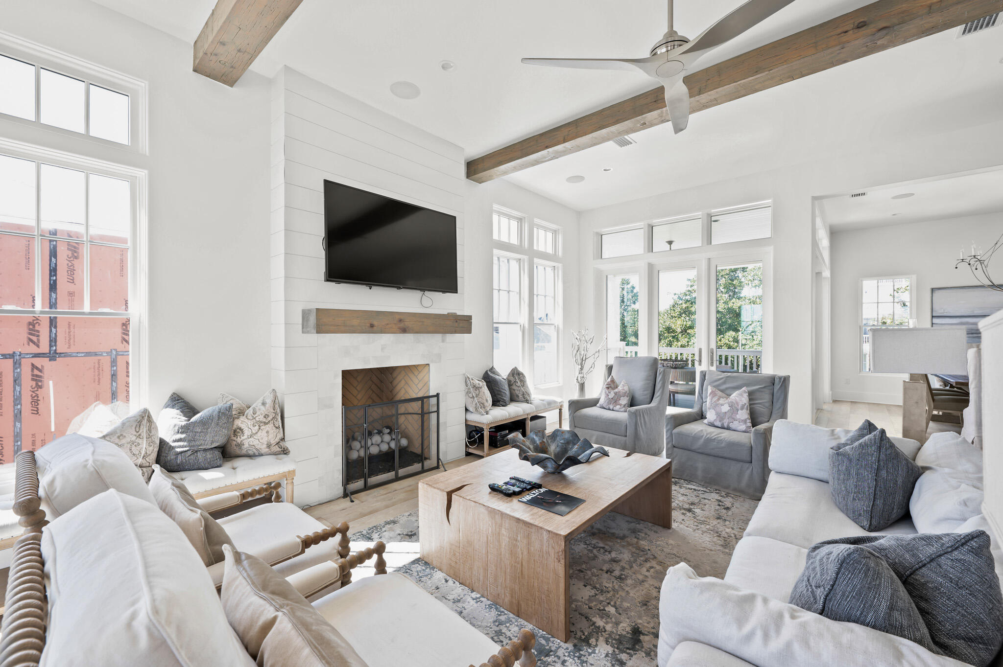 390 Walton Rose Lane Inlet Beach, FL 32461 - Photo 23 of 72 a living room with furniture a fireplace and a flat screen tv