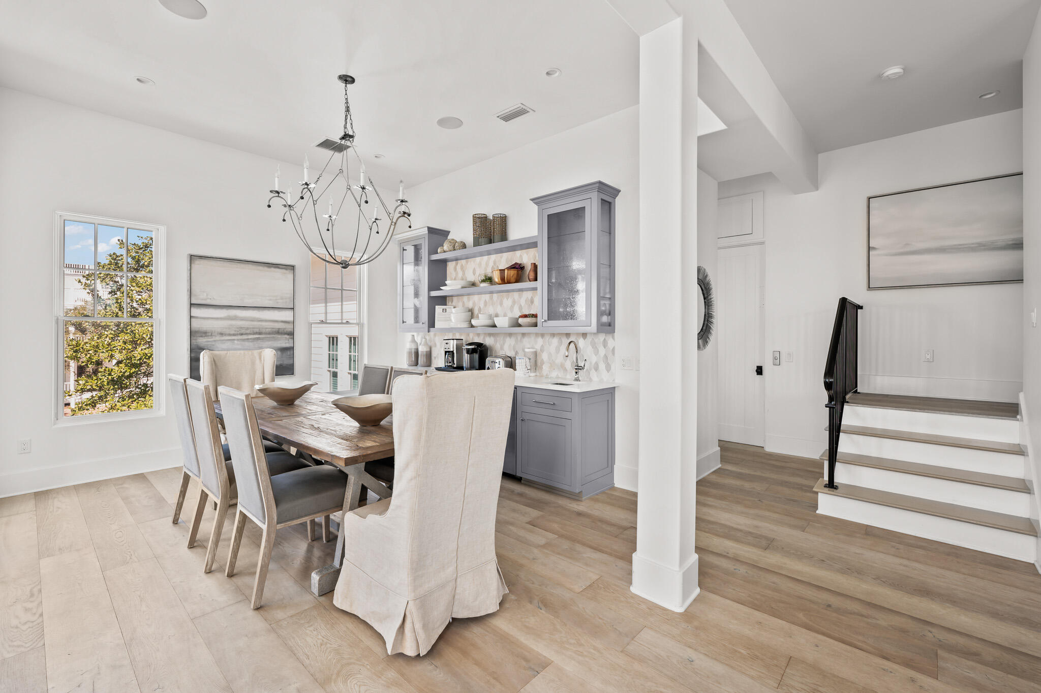 390 Walton Rose Lane Inlet Beach, FL 32461 - Photo 24 of 72 a view of a dining room with furniture and wooden floor
