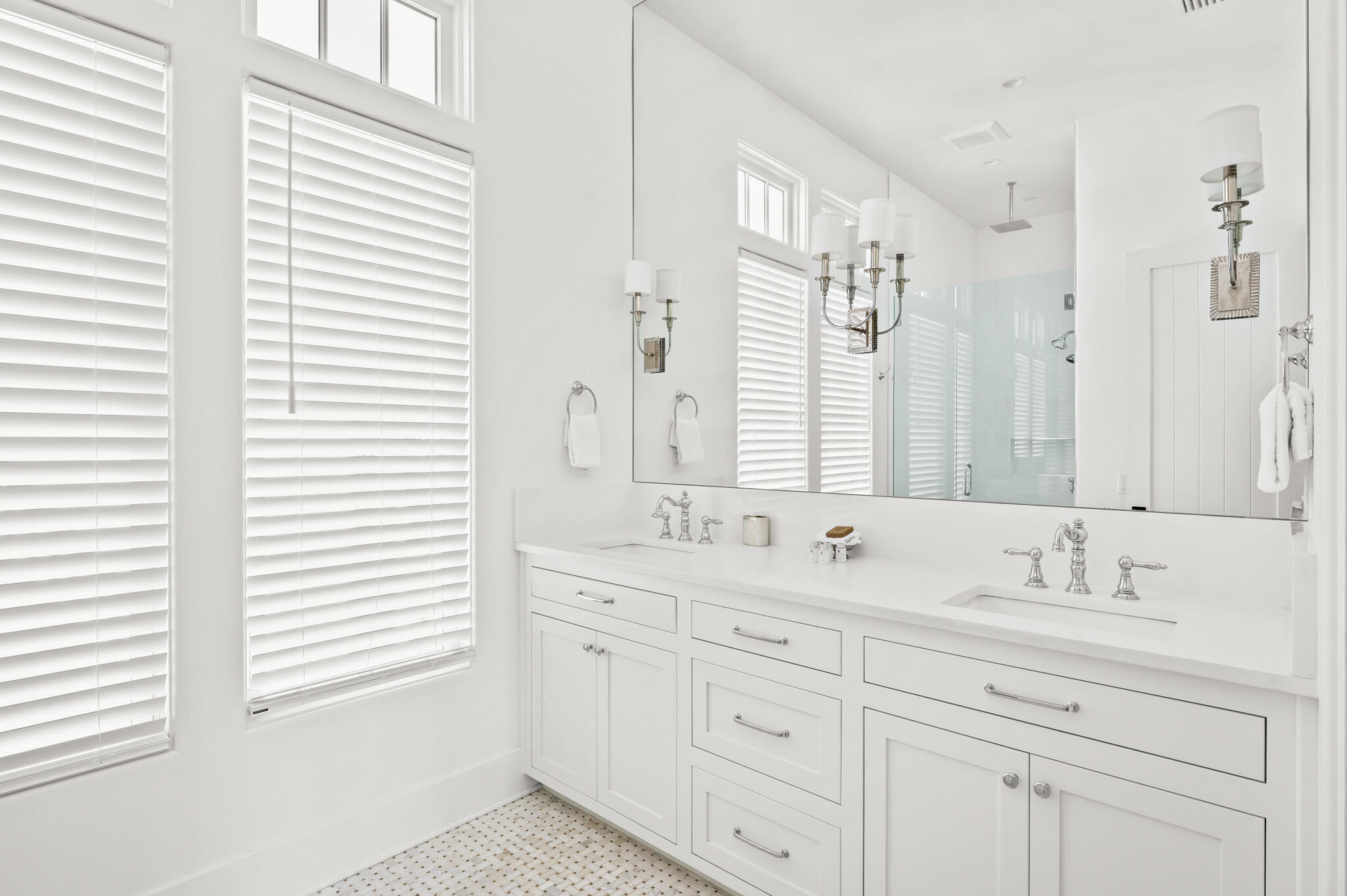 390 Walton Rose Lane Inlet Beach, FL 32461 - Photo 29 of 72 a bathroom with double vanity sink a mirror and a window