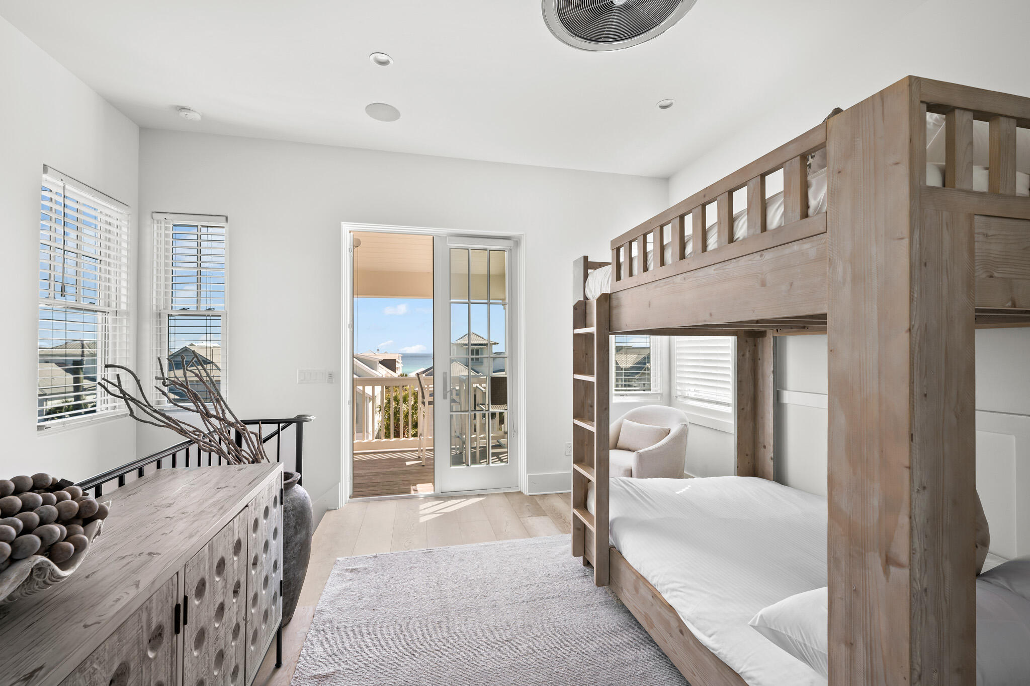 390 Walton Rose Lane Inlet Beach, FL 32461 - Photo 33 of 72 a bedroom with furniture and a large window
