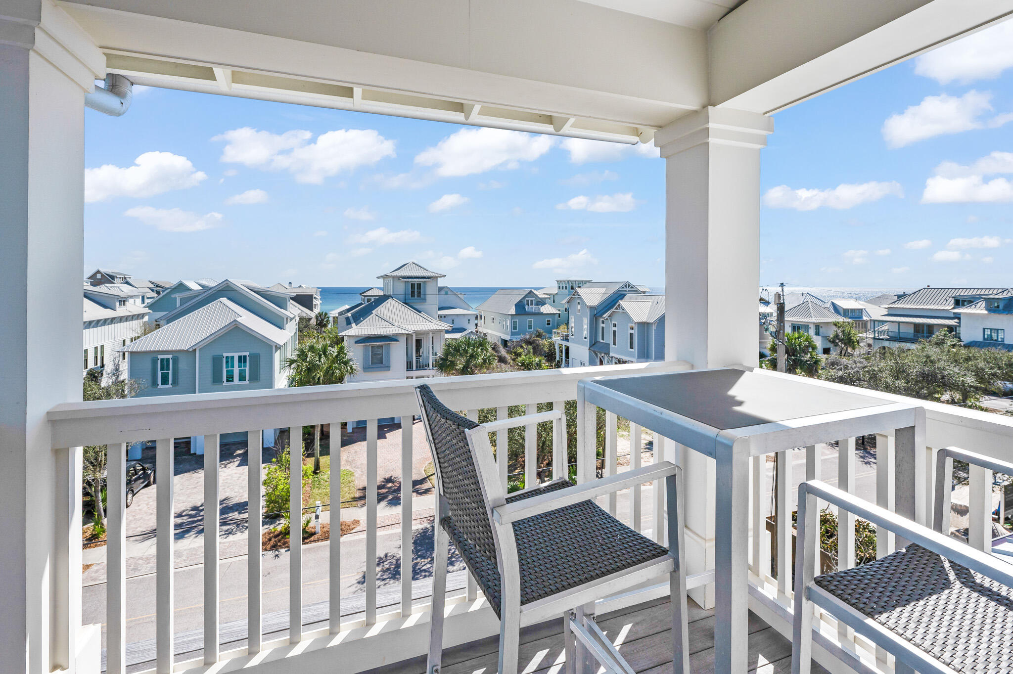 390 Walton Rose Lane Inlet Beach, FL 32461 - Photo 36 of 72 a view of a balcony with furniture