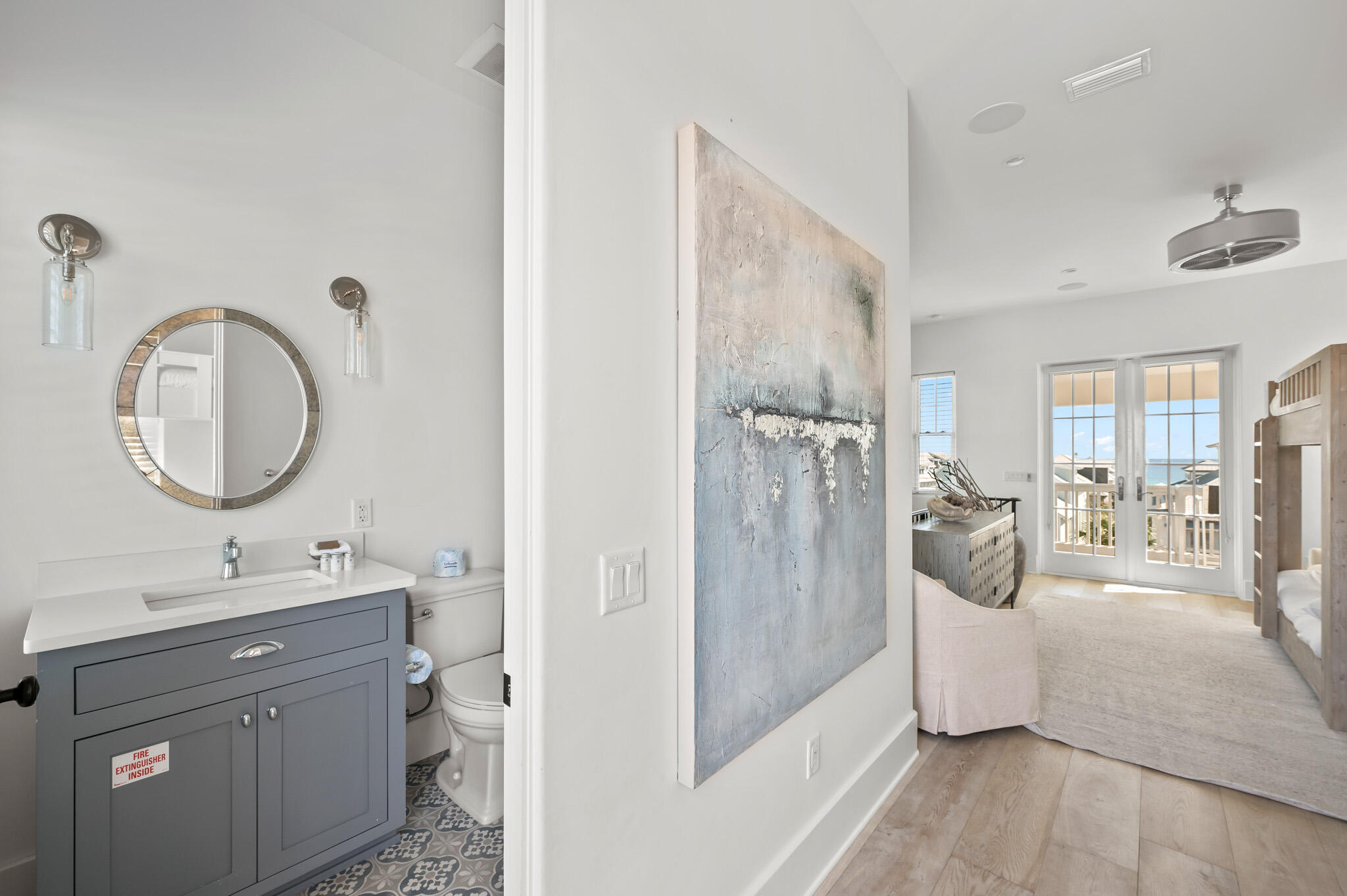 390 Walton Rose Lane Inlet Beach, FL 32461 - Photo 39 of 72 a en suite bathroom with a double vanity sink and a mirror