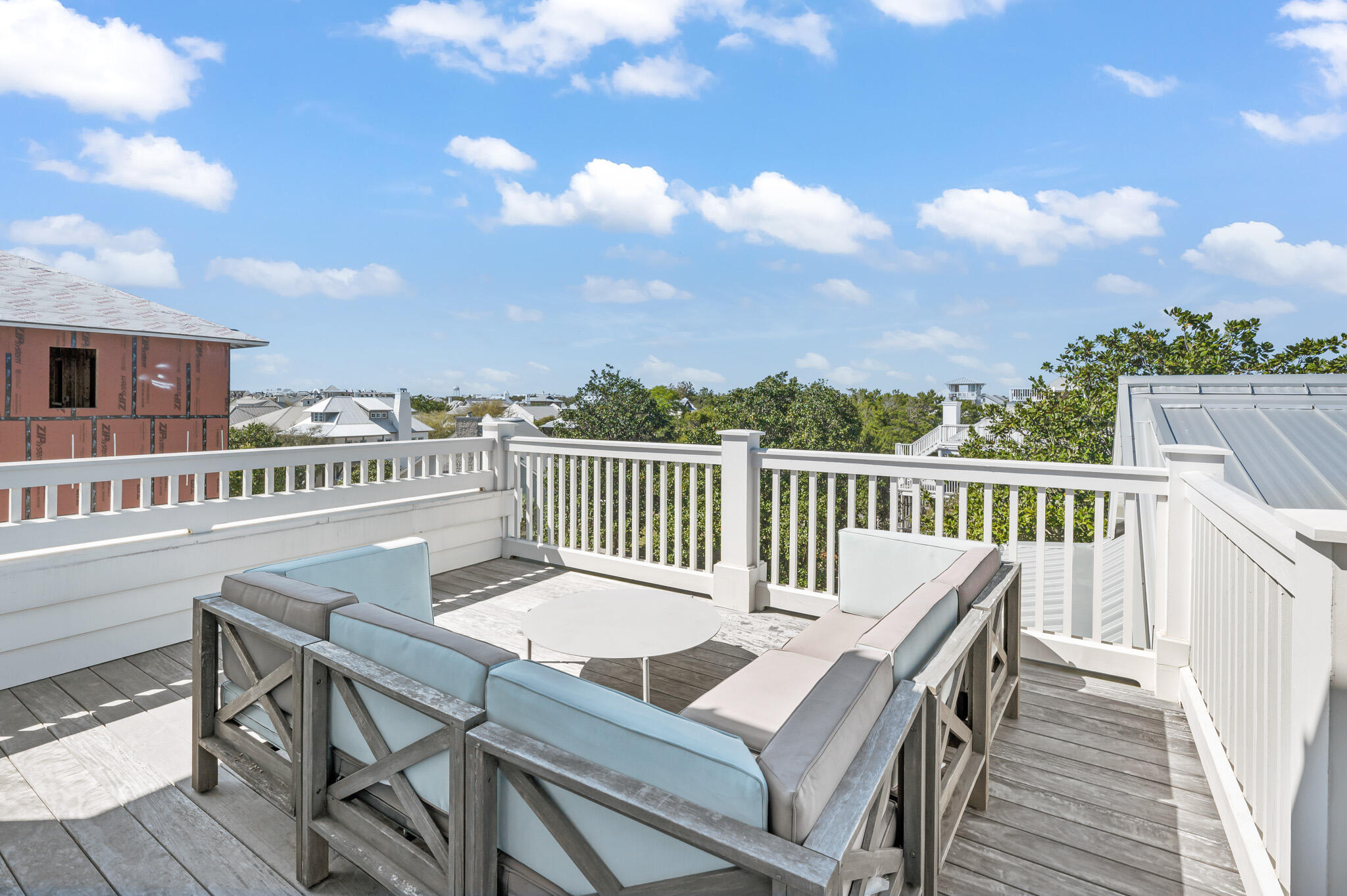 390 Walton Rose Lane Inlet Beach, FL 32461 - Photo 40 of 72 a view of a deck patio and outdoor seating