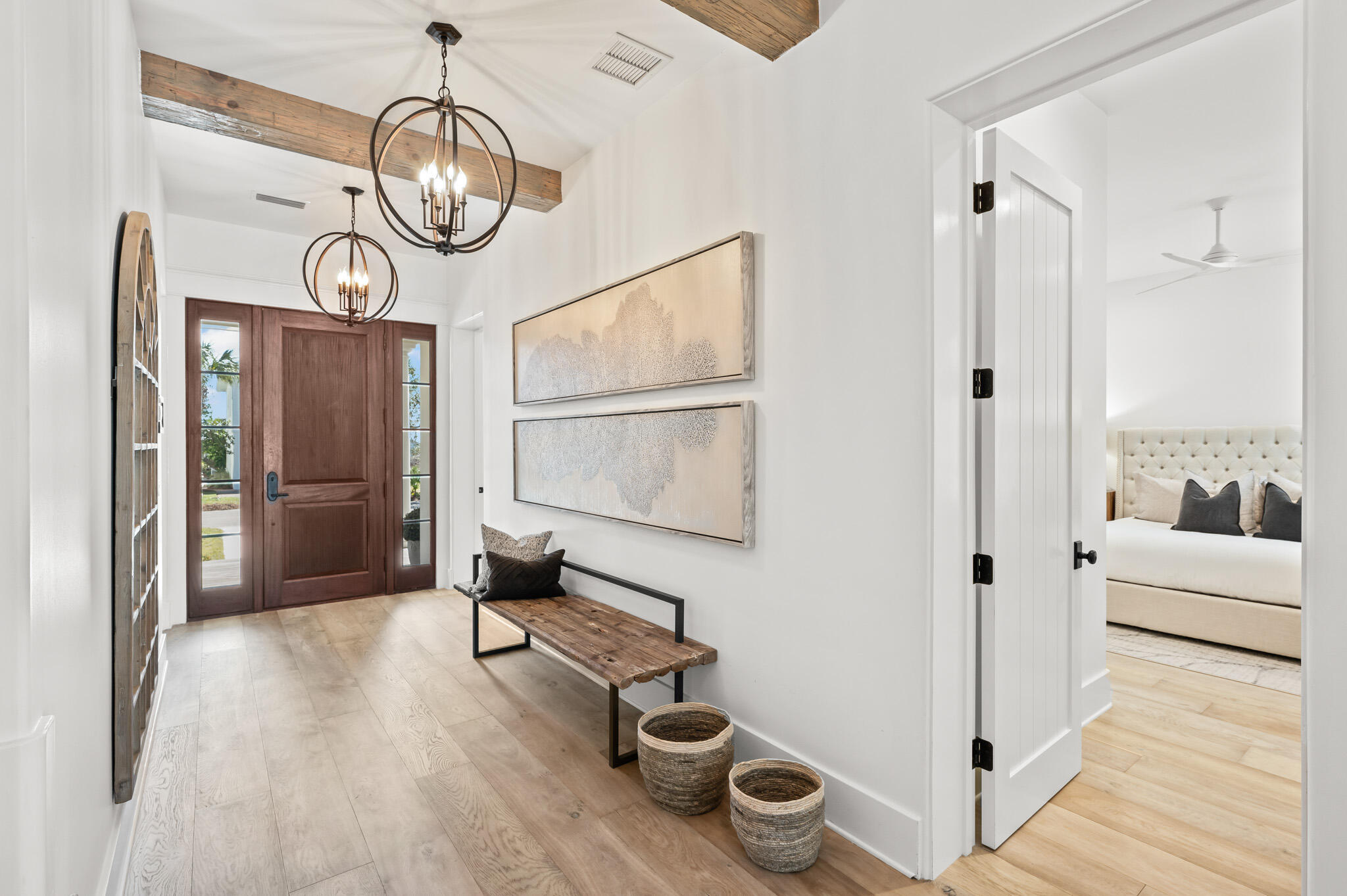 390 Walton Rose Lane Inlet Beach, FL 32461 - Photo 5 of 72 a view of a hallway with wooden floor and cabinets