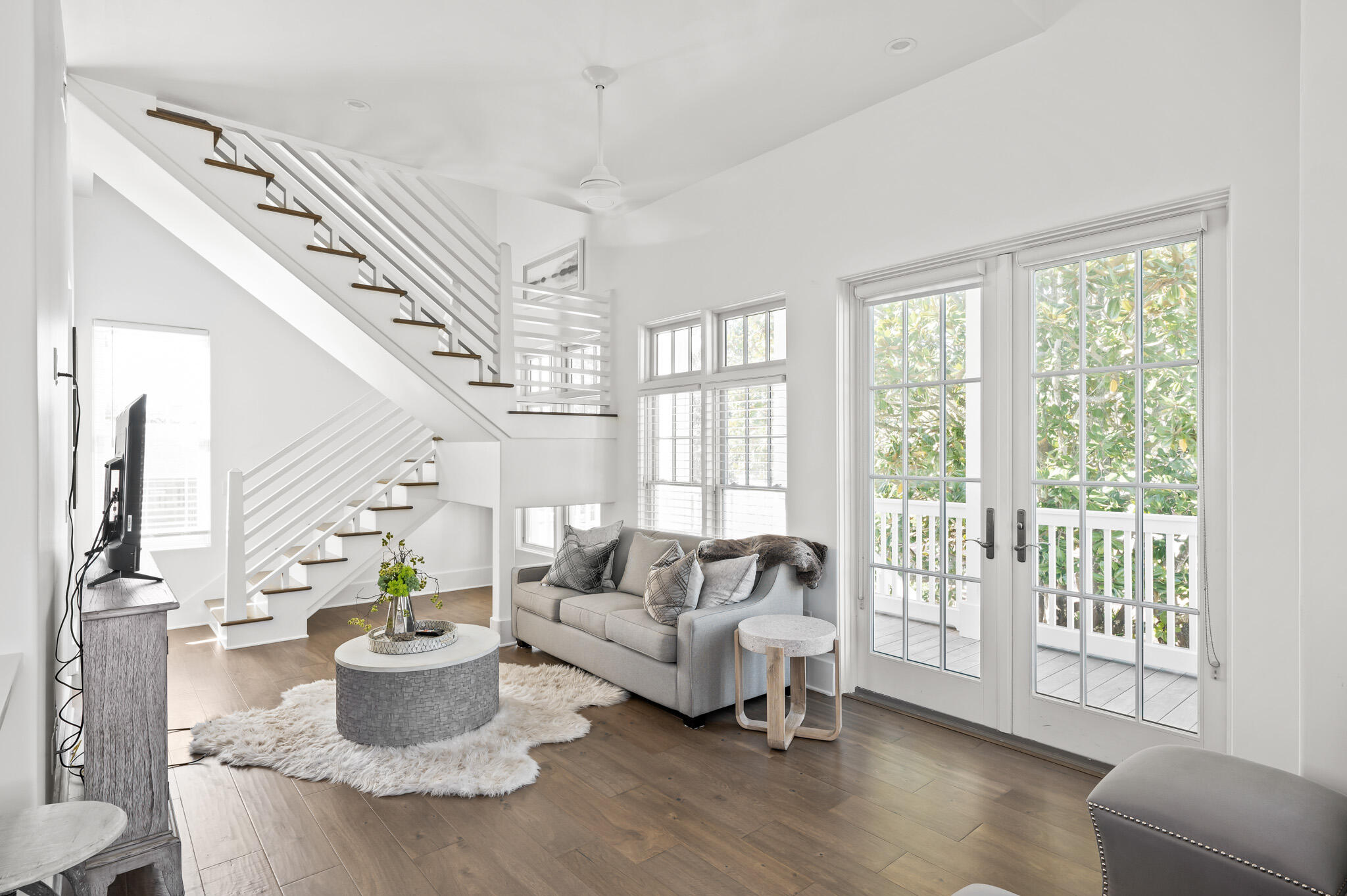 390 Walton Rose Lane Inlet Beach, FL 32461 - Photo 60 of 72 a living room with furniture and a potted plant