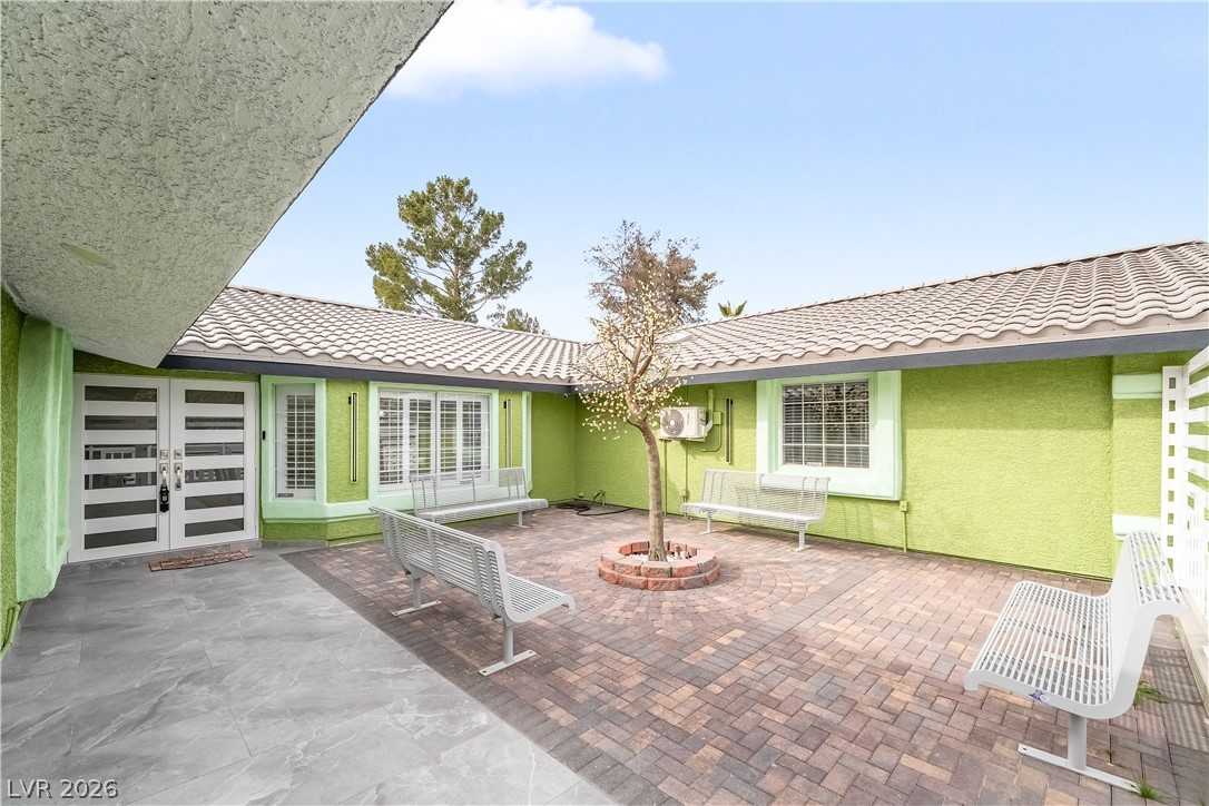 3160 East Viking Road Las Vegas, NV 89121 - Photo 26 of 99 View of patio featuring a fire pit