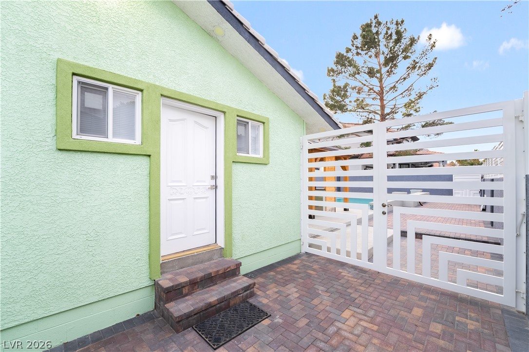 3160 East Viking Road Las Vegas, NV 89121 - Photo 30 of 99 View of exterior entry with stucco siding