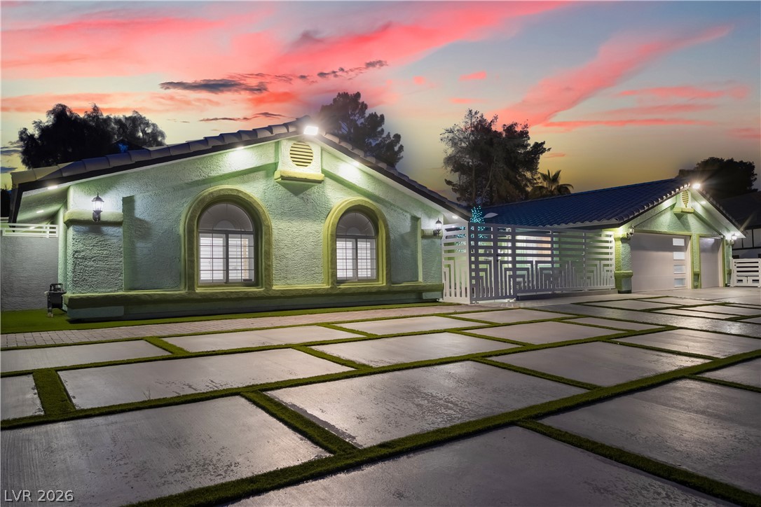 3160 East Viking Road Las Vegas, NV 89121 - Photo 3 of 99 View of front of home featuring stucco siding