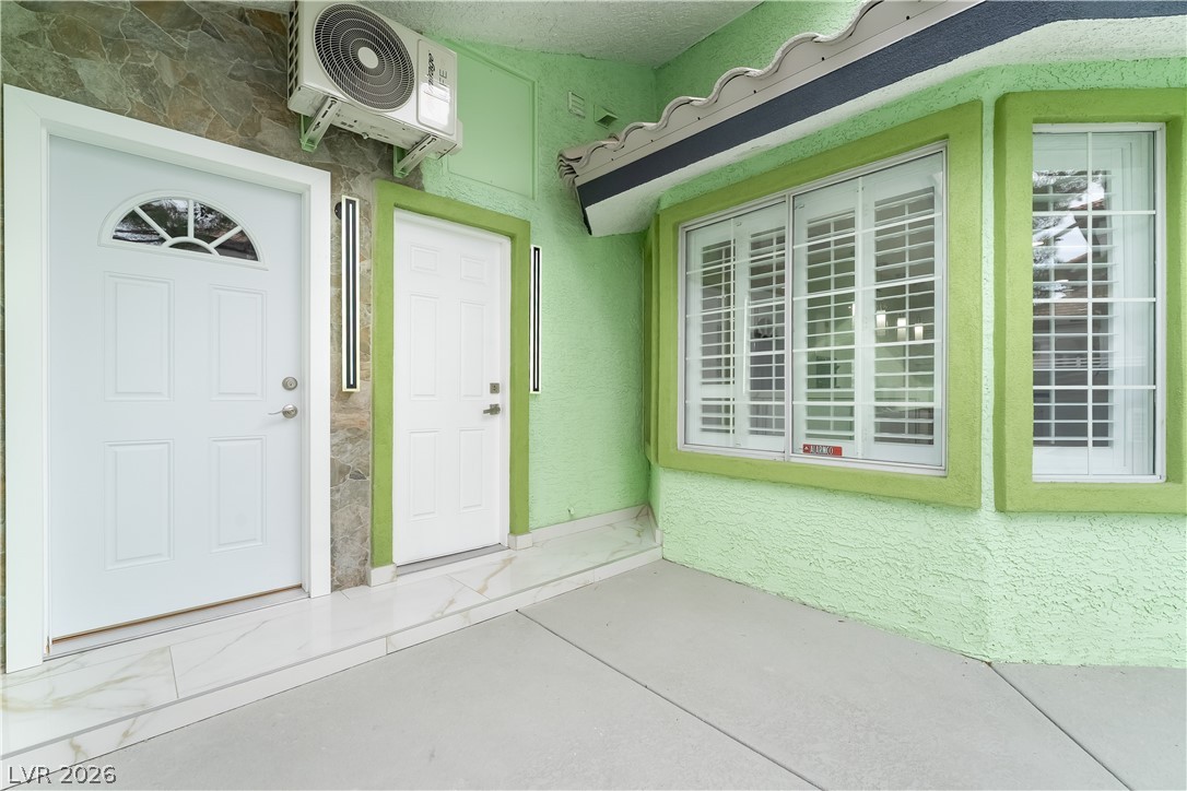 3160 East Viking Road Las Vegas, NV 89121 - Photo 31 of 99 Property entrance with stucco siding