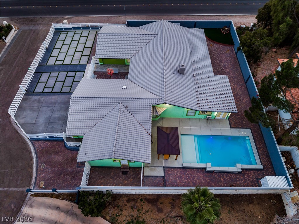 3160 East Viking Road Las Vegas, NV 89121 - Photo 4 of 99 View of subject property featuring a pool