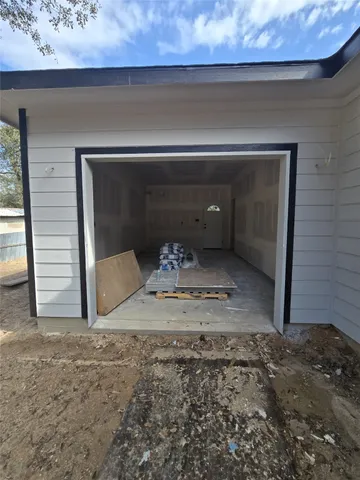 a view of a livingroom with wooden floor