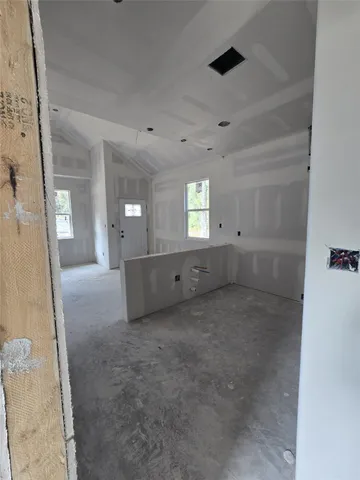 a view of an empty room and window