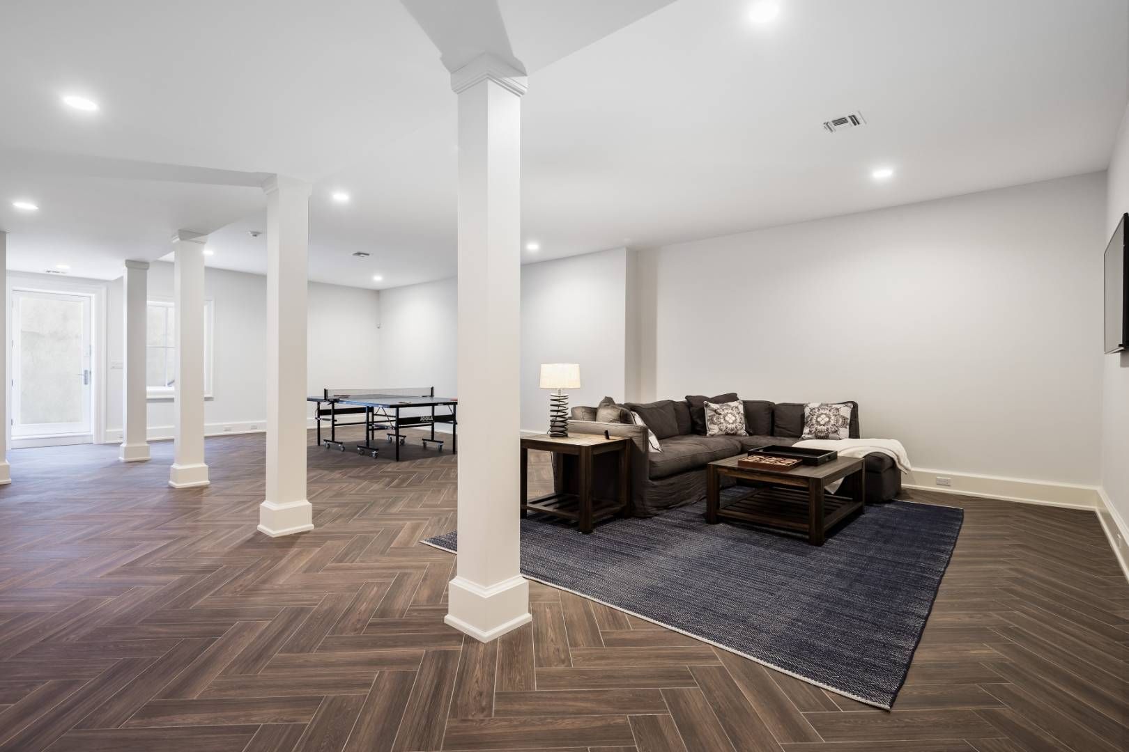 6 Shady Pth Bridgehampton, NY 11963 - Photo 18 of 20 a living room with lots of furniture and a wooden floor