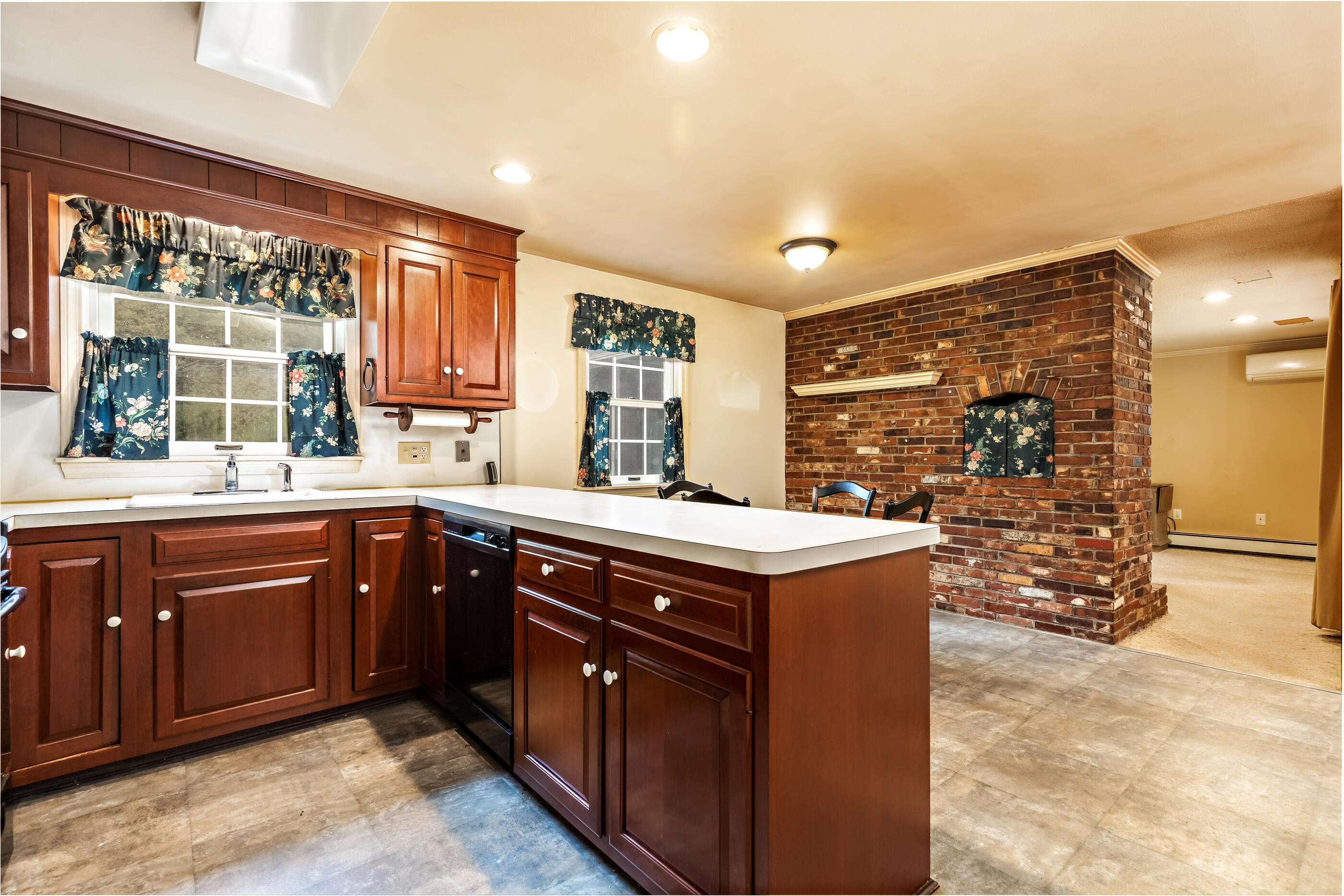 76 Goose Point Road Centerville, MA 02601 - Photo 12 of 34 a kitchen with stainless steel appliances granite countertop a stove and a sink