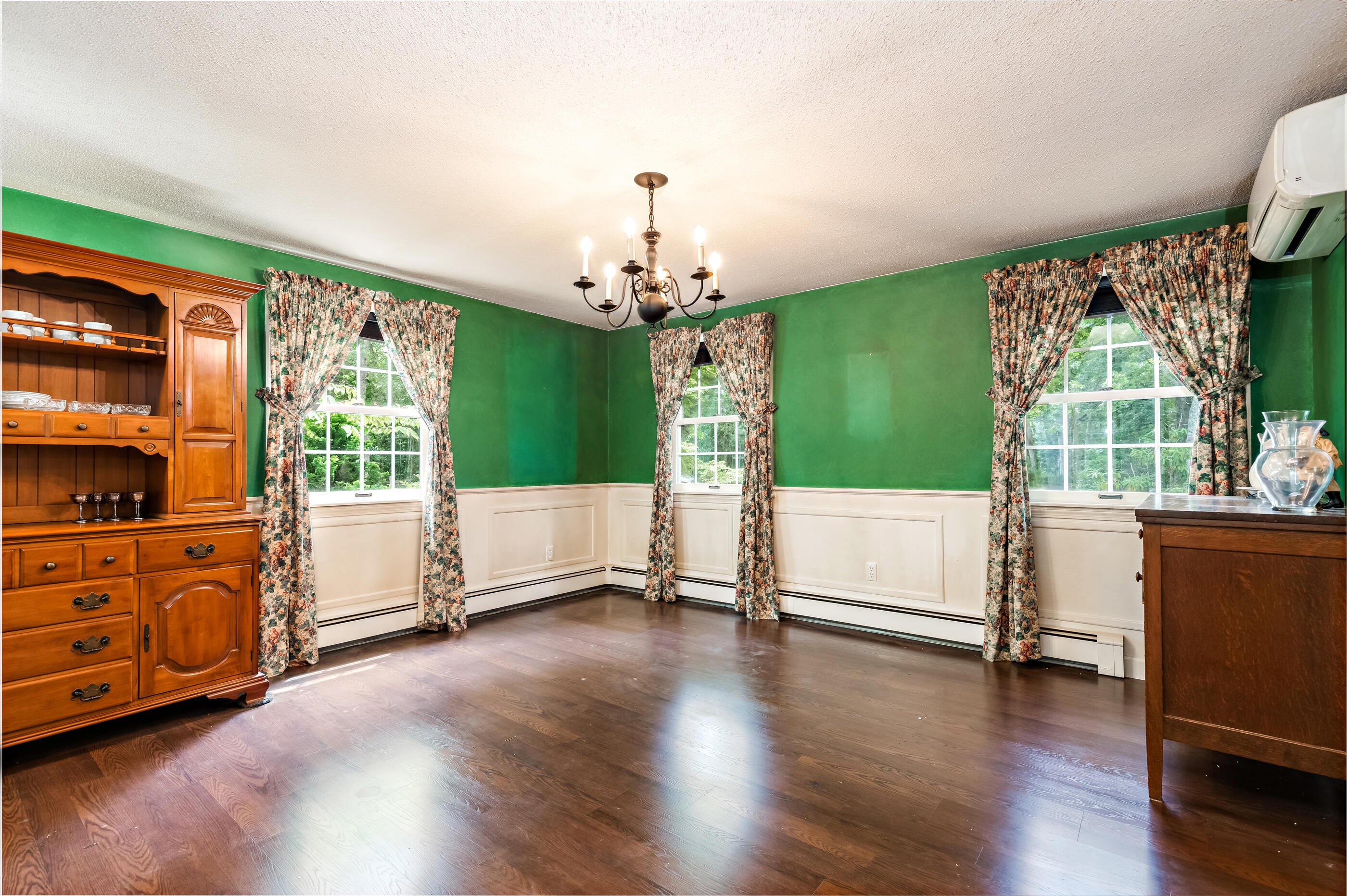 76 Goose Point Road Centerville, MA 02601 - Photo 18 of 34 a living room with hard wood floors and a window