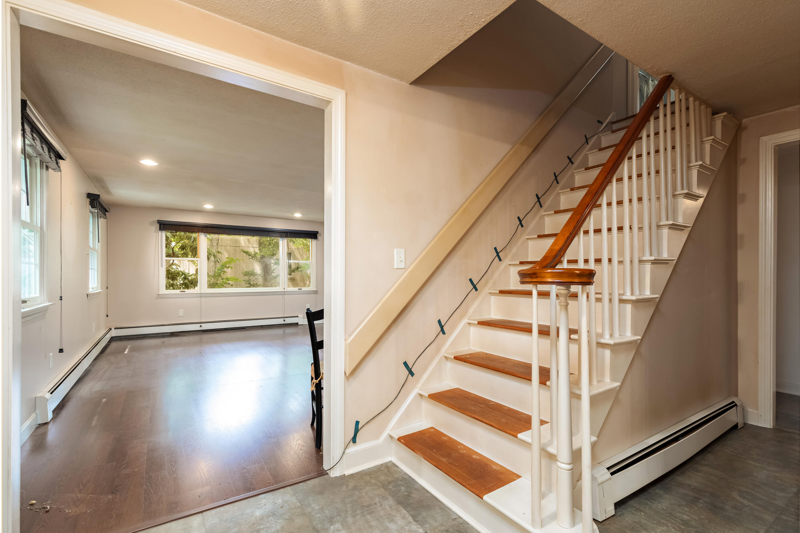 76 Goose Point Road Centerville, MA 02601 - Photo 26 of 34 a view of entryway with wooden floor and stairs