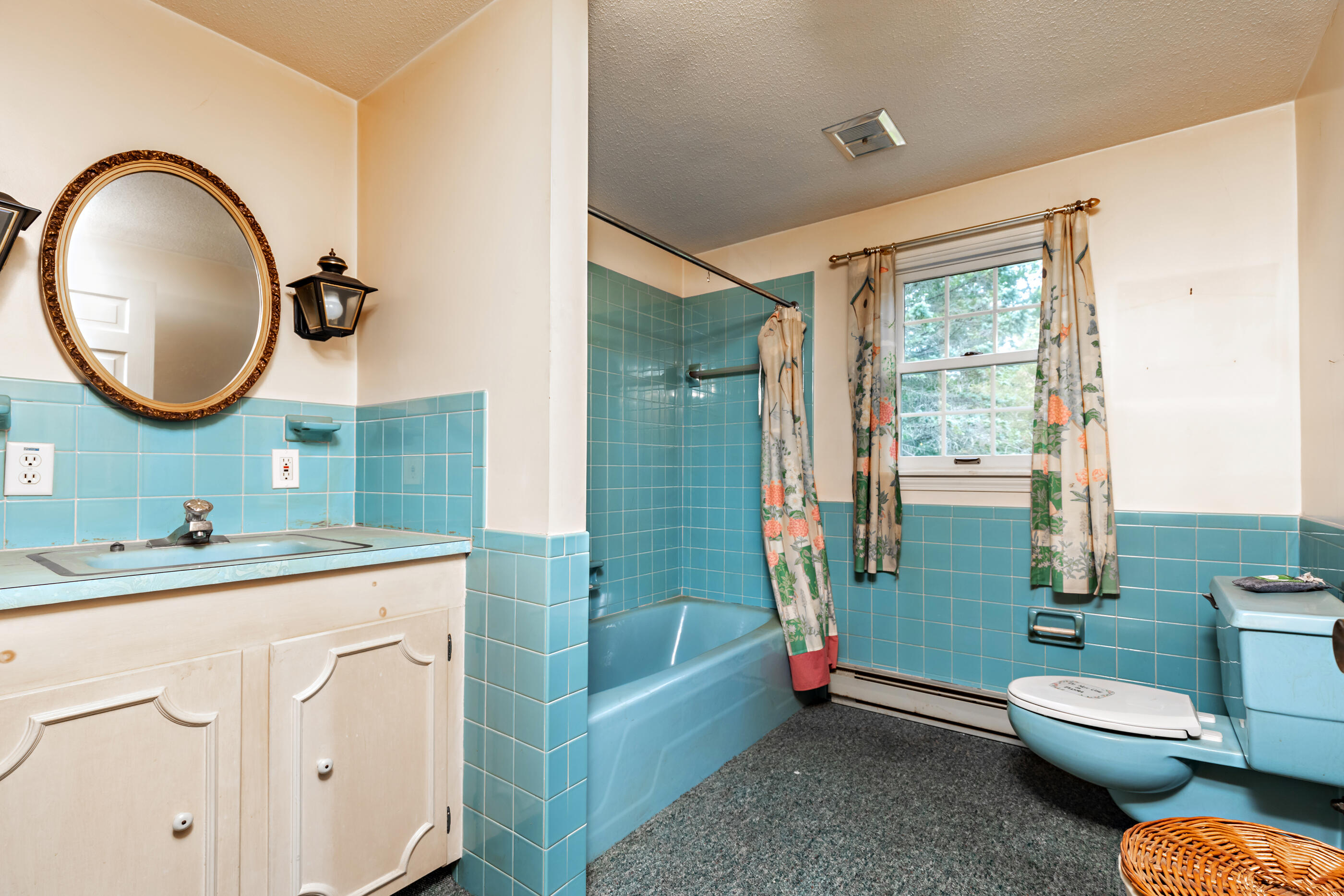 76 Goose Point Road Centerville, MA 02601 - Photo 32 of 34 a bathroom with a toilet sink and mirror