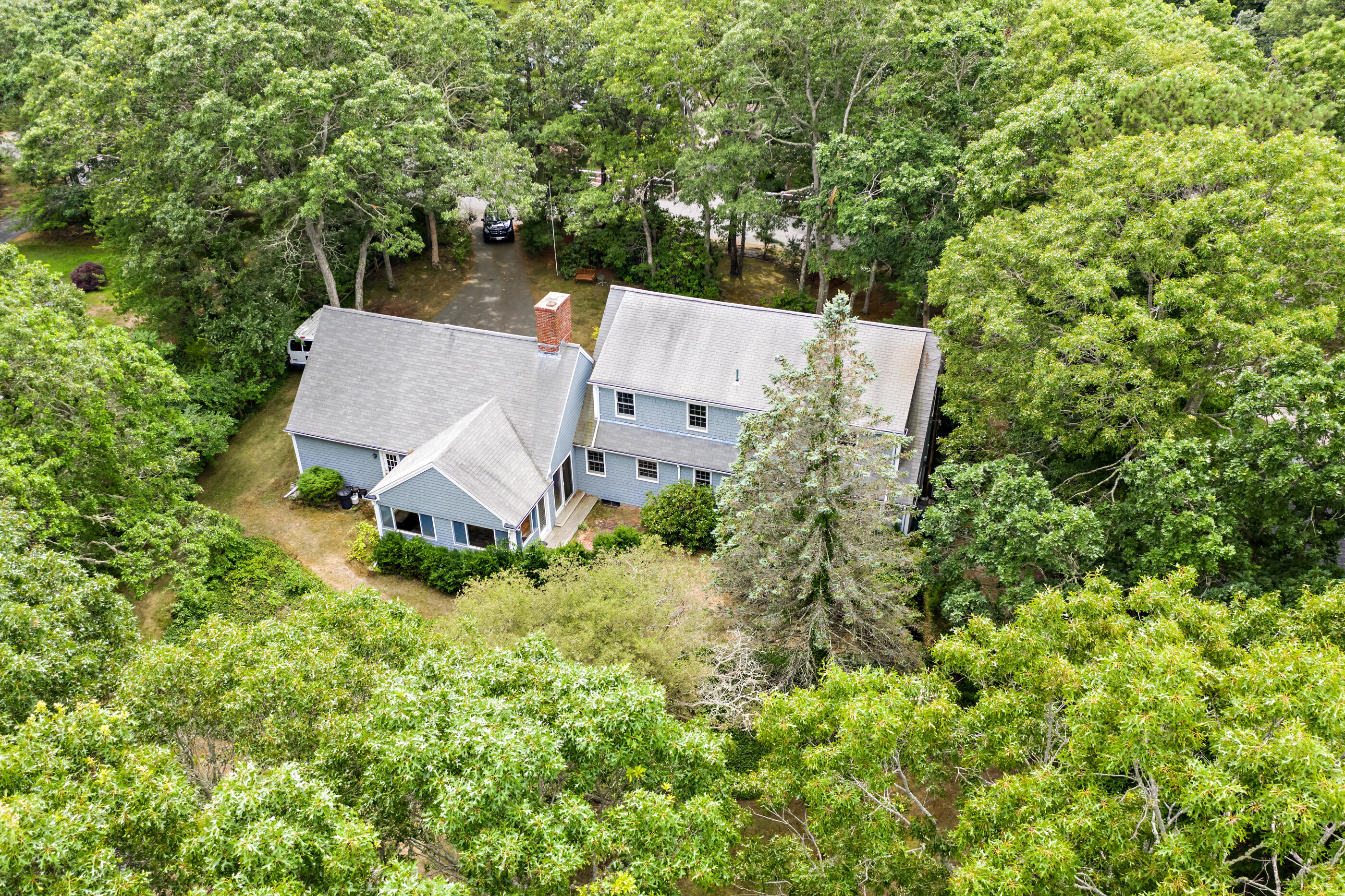 76 Goose Point Road Centerville, MA 02601 - Photo 7 of 34 an aerial view of a house with yard and outdoor space