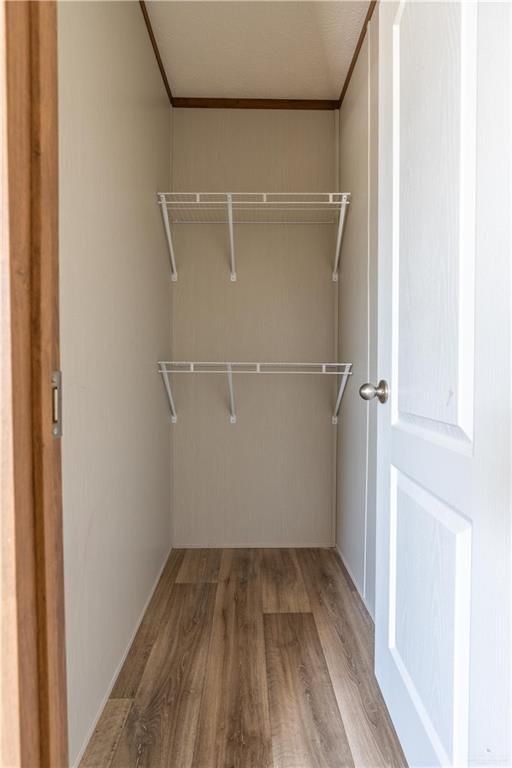 36042 Ranch Park Road San Benito, TX 78586 - Photo 17 of 25 a view of a room with racks on the wall