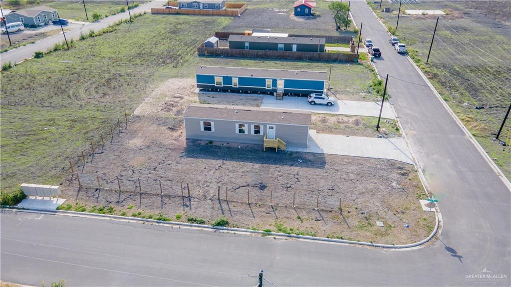 36042 Ranch Park Road San Benito, TX 78586 - Photo 19 of 25 a view of a house with a yard