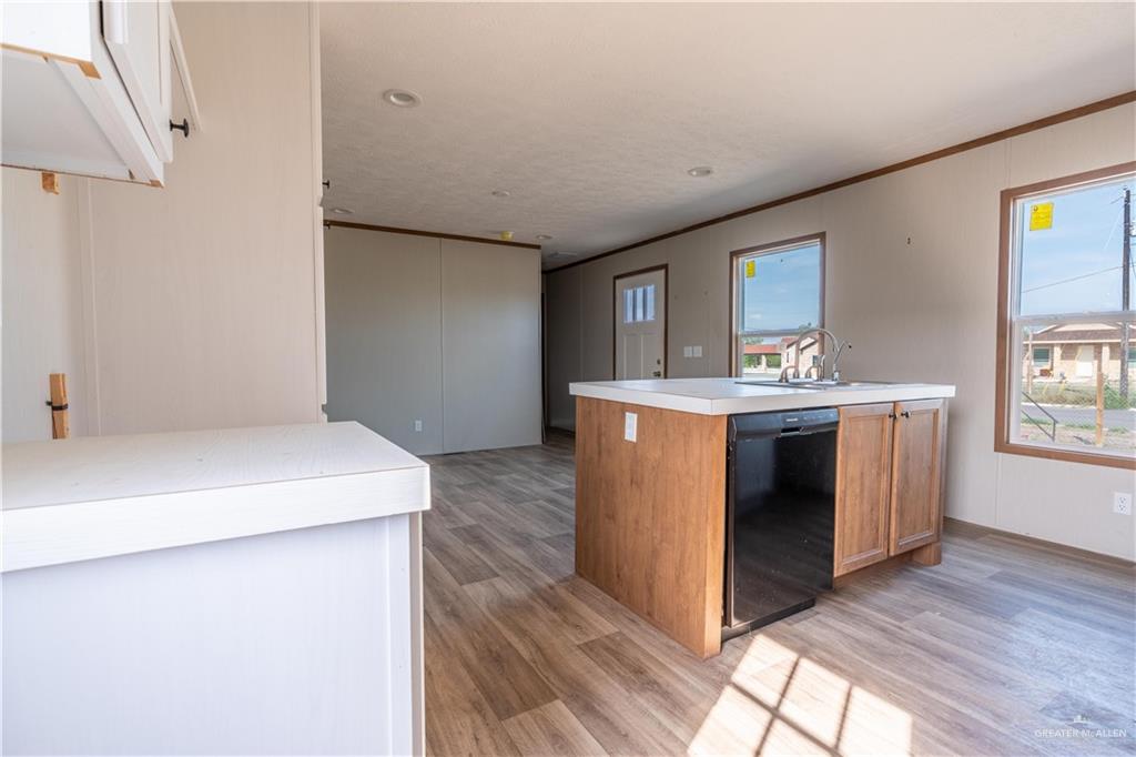 36042 Ranch Park Road San Benito, TX 78586 - Photo 6 of 25 a utility room with washer and dryer
