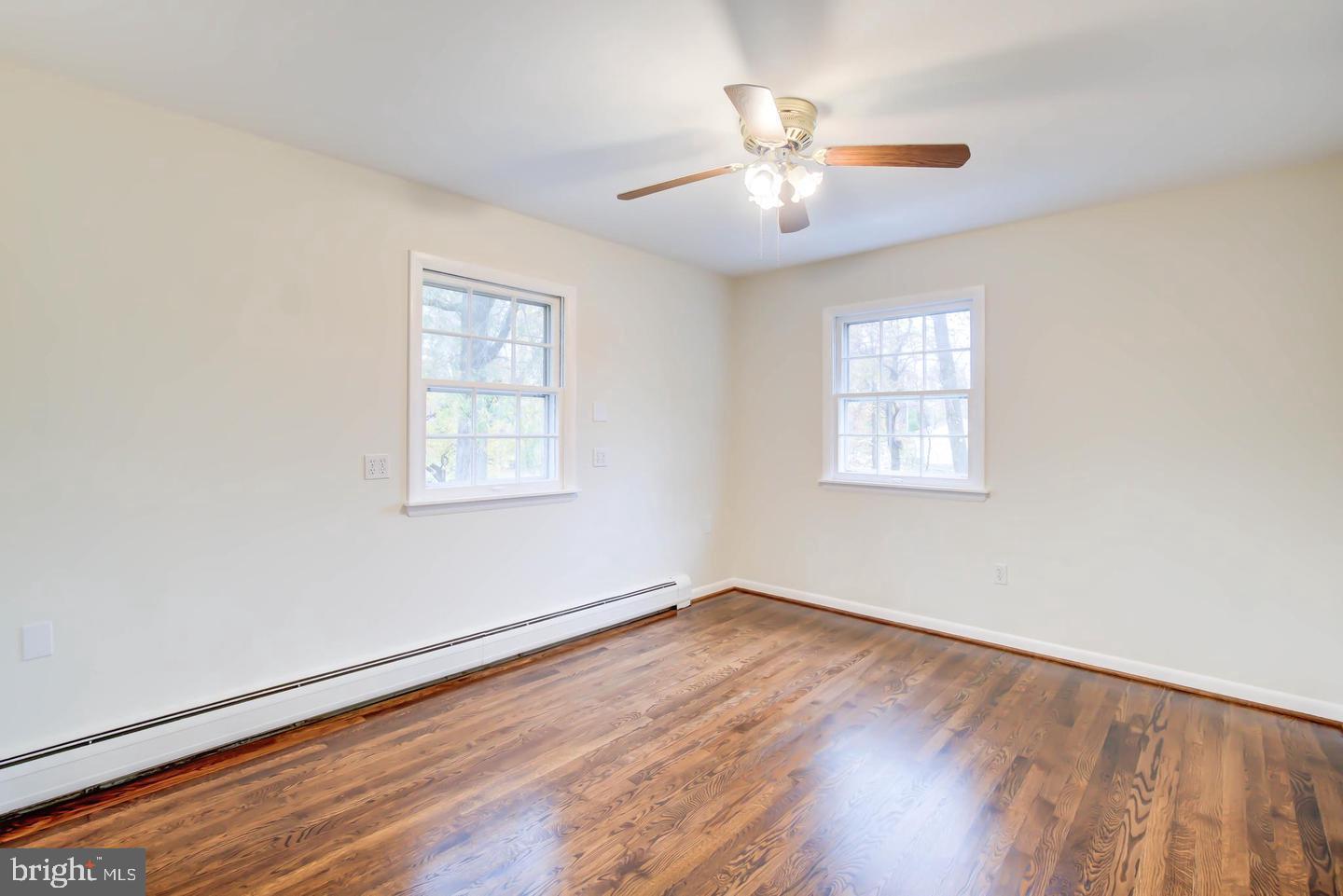 11207 Emack Road Beltsville, MD 20705 - Photo 24 of 43 Bright and airy room with hardwood floors.