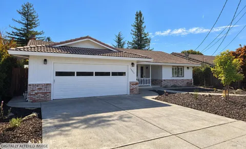 a front view of a house with yard