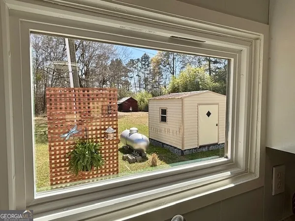 a view of a living room and a window