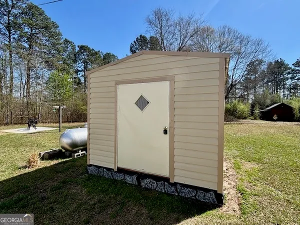 a view of a backyard with a garden